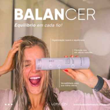 Mulher loira segurando o shampoo da linha Balancer da London Cosméticos